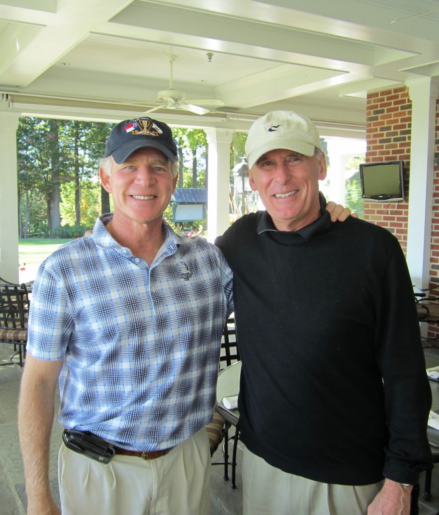 Current CIA Director and then Senator Dan Coats playing golf with Gil at Caves Valley.
